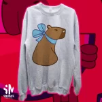 Capibara con moño azul